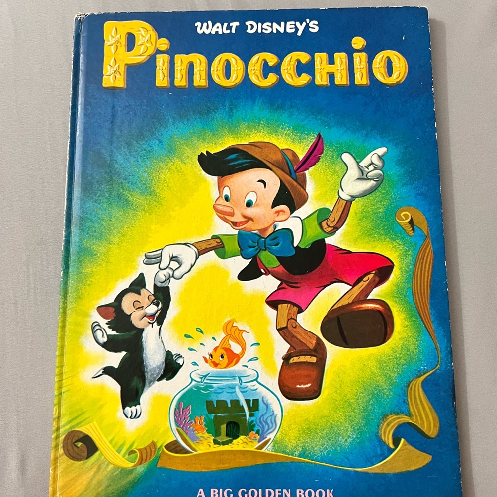 Rae Walt Disney Pinocchio Blue and Yellow Book, a big golden book